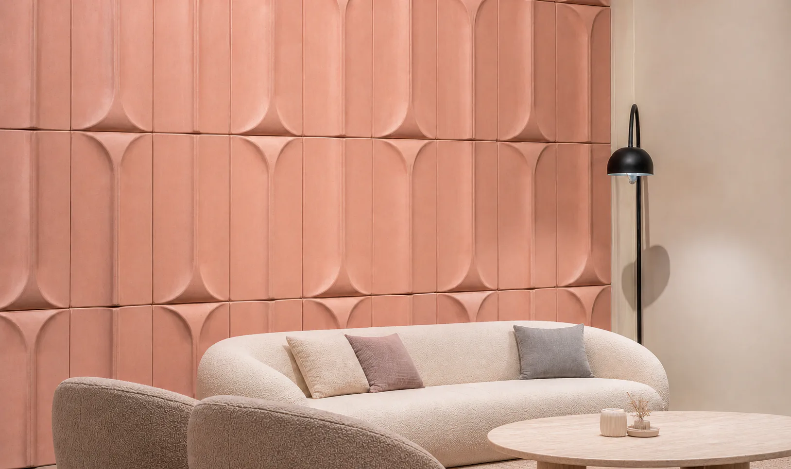 Supplier-provided visualization of pink 3D arc PET acoustic wall panels in a furnished room